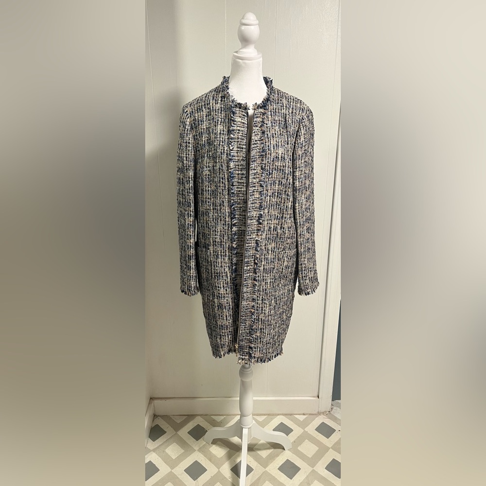 Mid length jacket with fringe. Multi colored. Smoke free home clean no damage